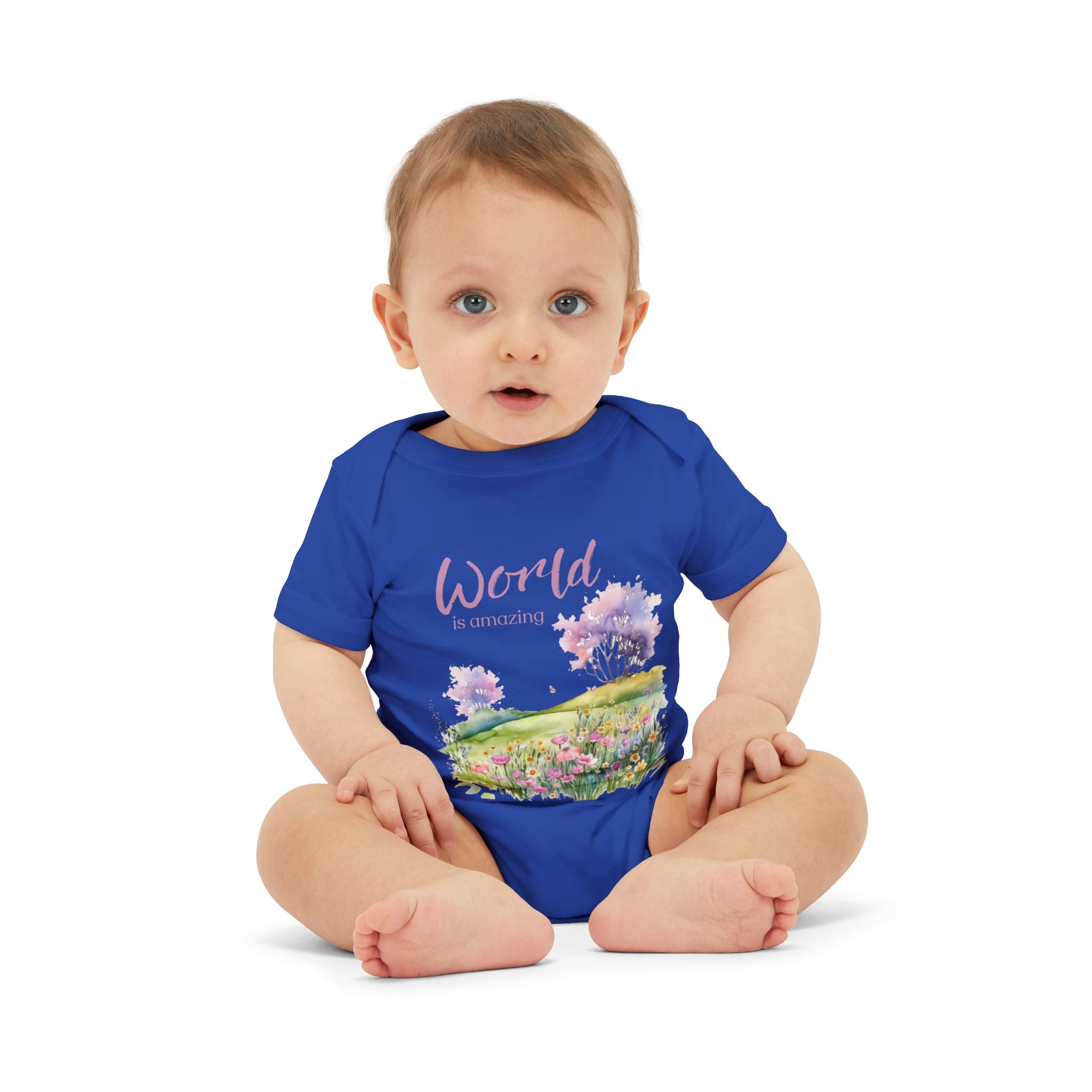 Baby onesie with "World is amazing" text and pastel nature design, made from soft 100% Airlume cotton