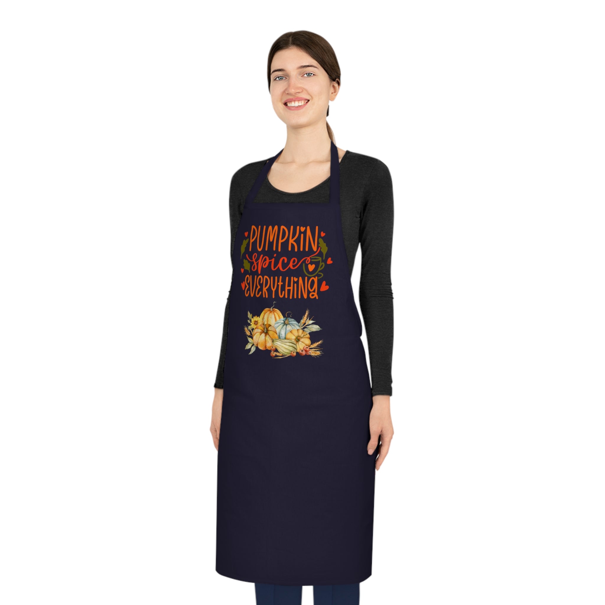 Person wearing a navy apron with 'Pumpkin Spice Everything' text and graphics on a white background