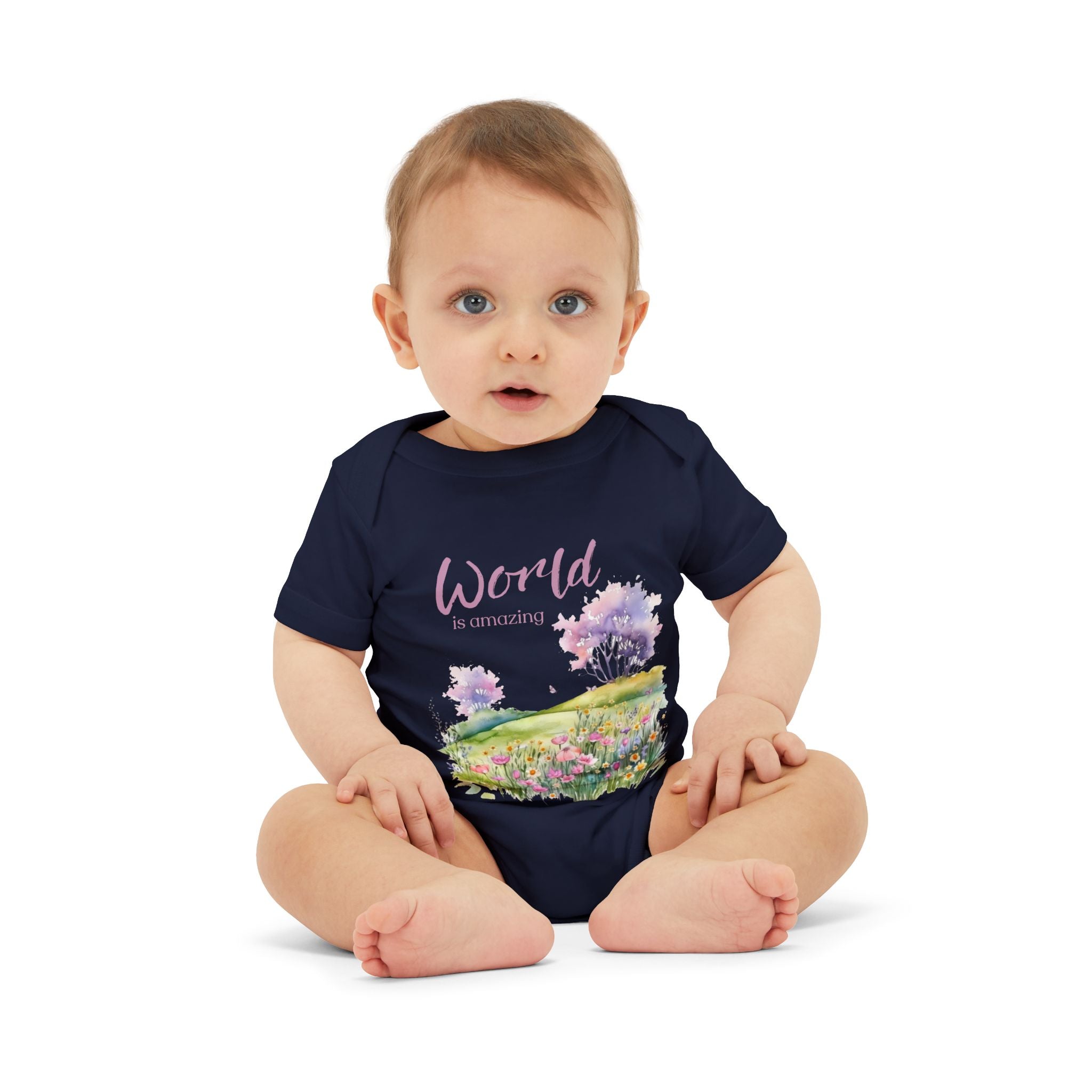Baby onesie with "World is amazing" text and pastel nature design, made from soft 100% Airlume cotton
