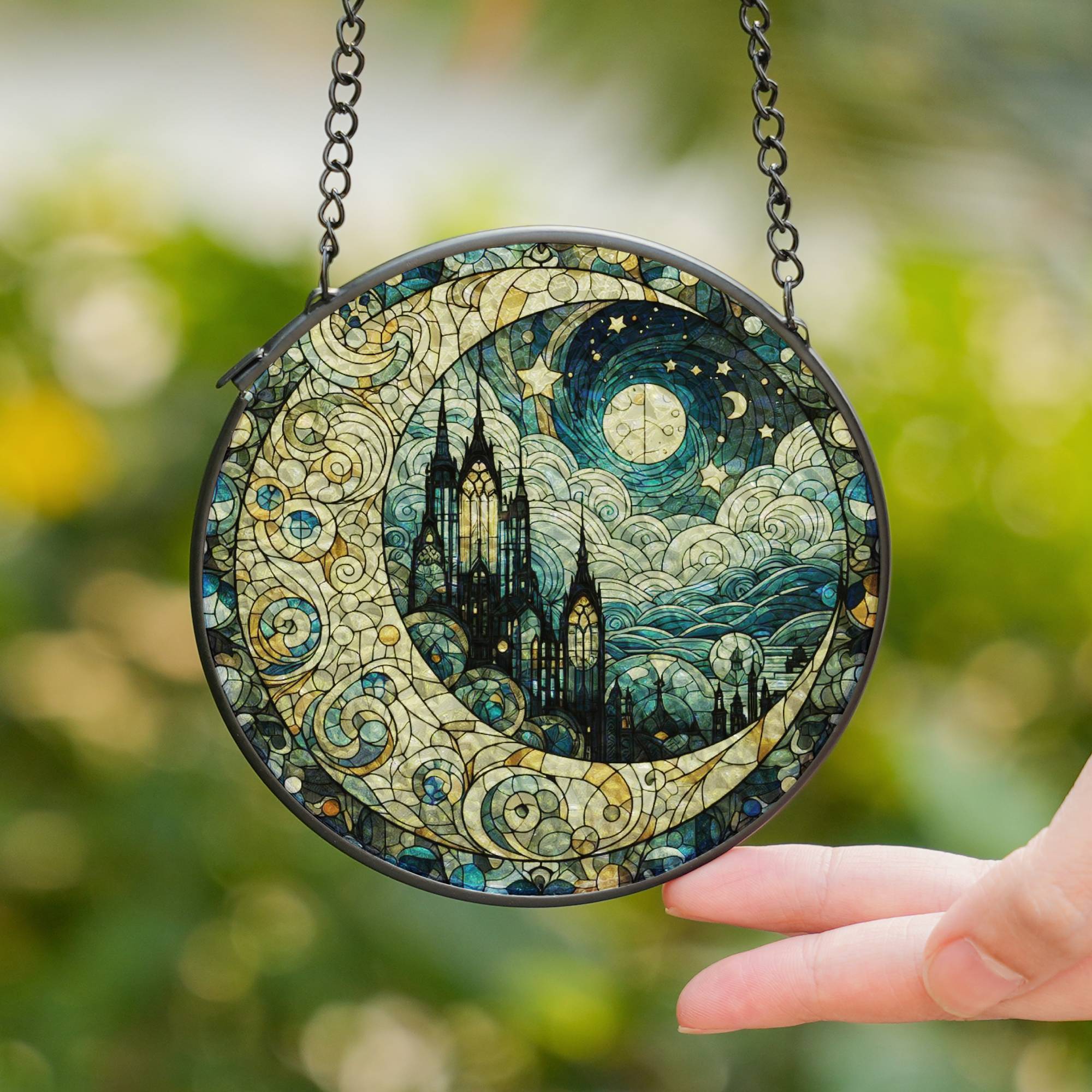 Stained glass window hanging featuring gothic cathedral, crescent moon, and starry sky - handmade suncatcher decor for home or gift