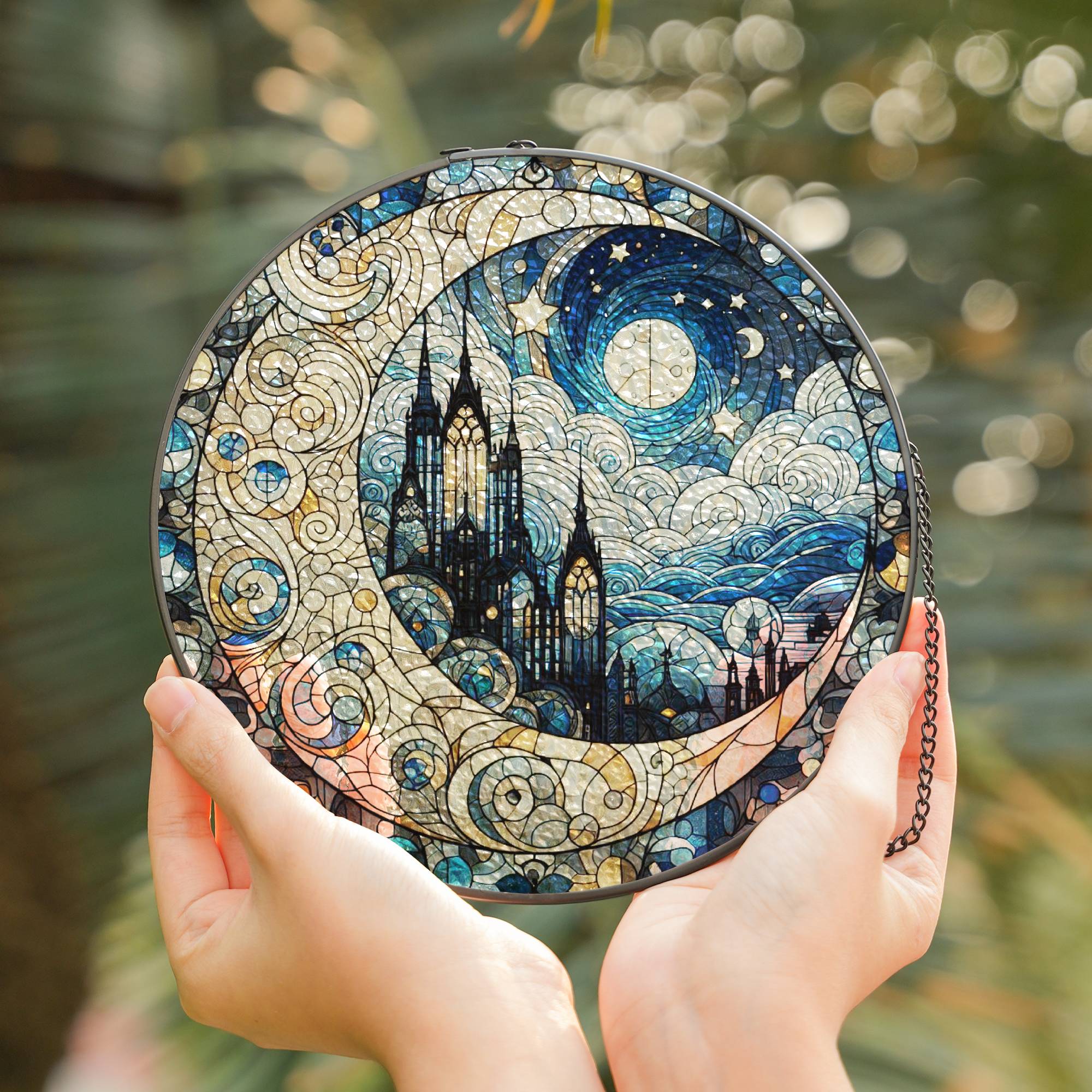 Stained glass window hanging featuring gothic cathedral, crescent moon, and starry sky—handmade suncatcher decor for home or gift