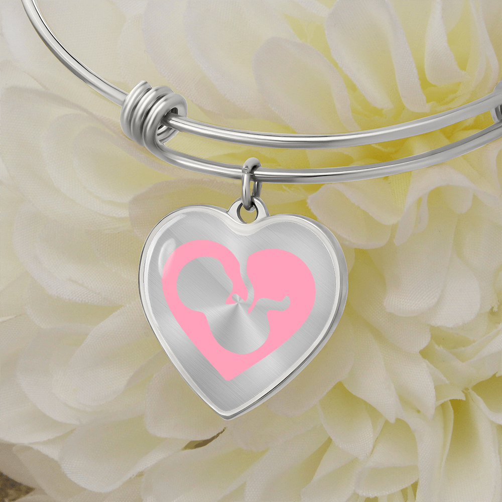Pro-Life silver Heart Bracelet, featuring a graceful fetal silhouette embraced in a soft pink heart