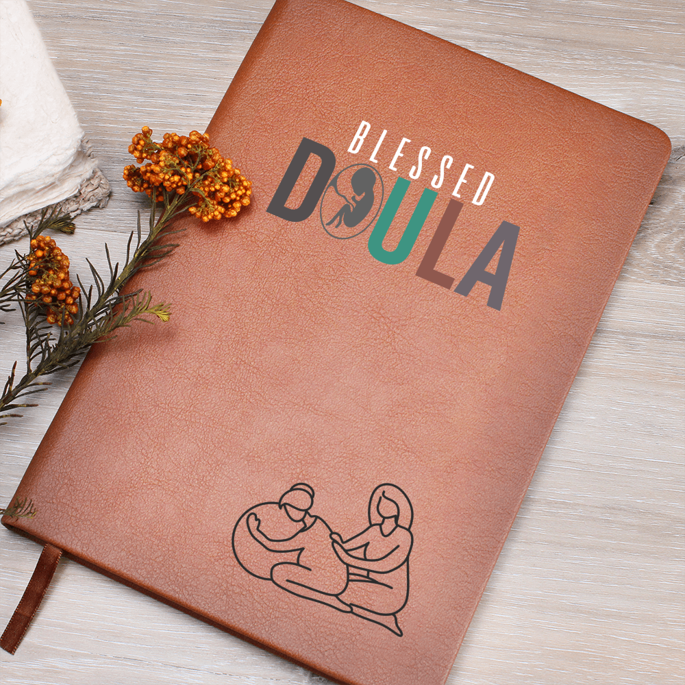 Journal for a doula on a premium vegan leather cover, includes 200 lined pages, a ribbon bookmark, and a brown elastic closure band.