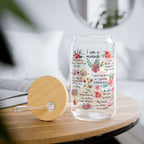 Glass tumbler with floral design and text  for a midwife on a wooden table
