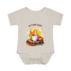 Beige baby onesie with autumn-themed design and 'AUTUMN BABY' text on a white background