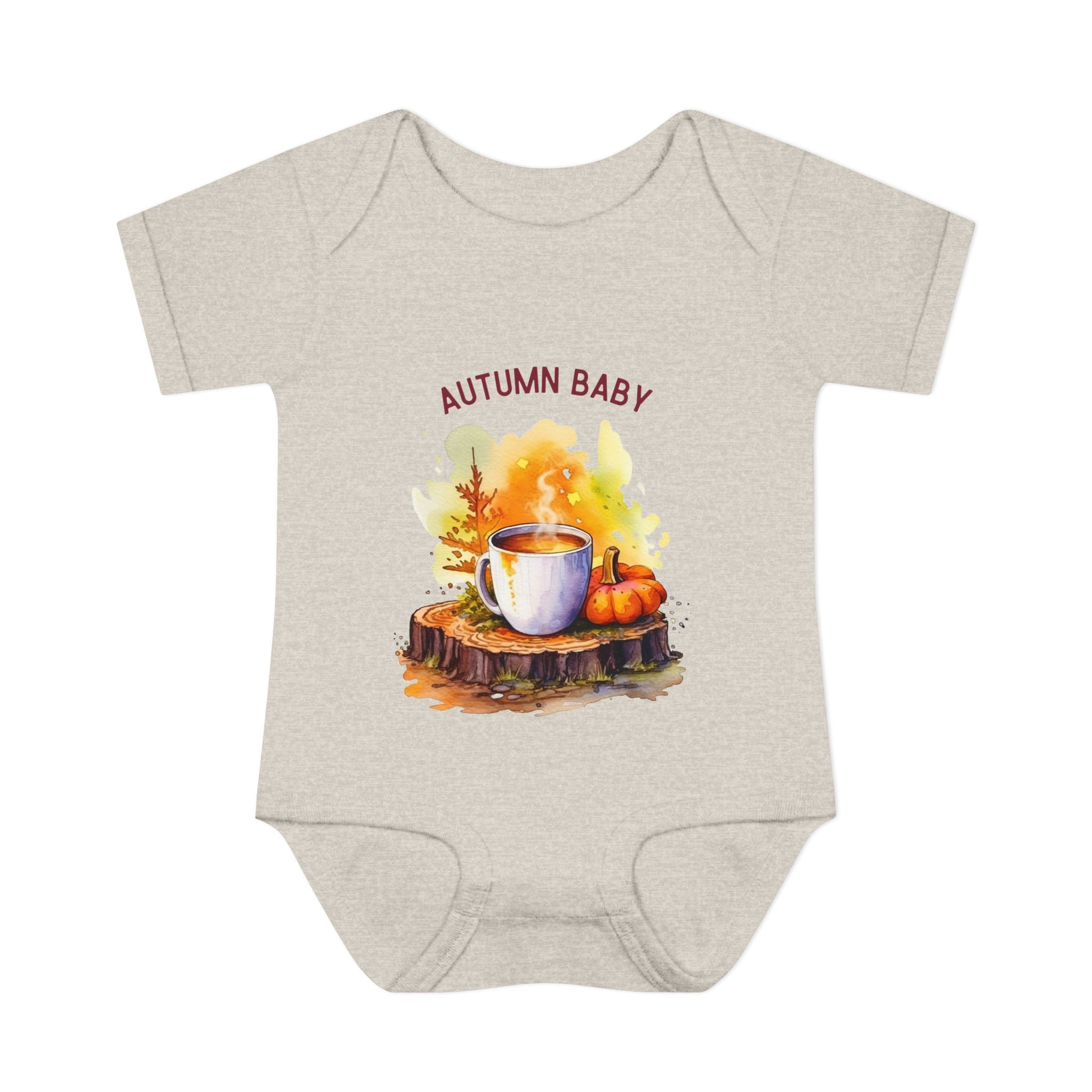 Beige baby onesie with autumn-themed design and 'AUTUMN BABY' text on a white background