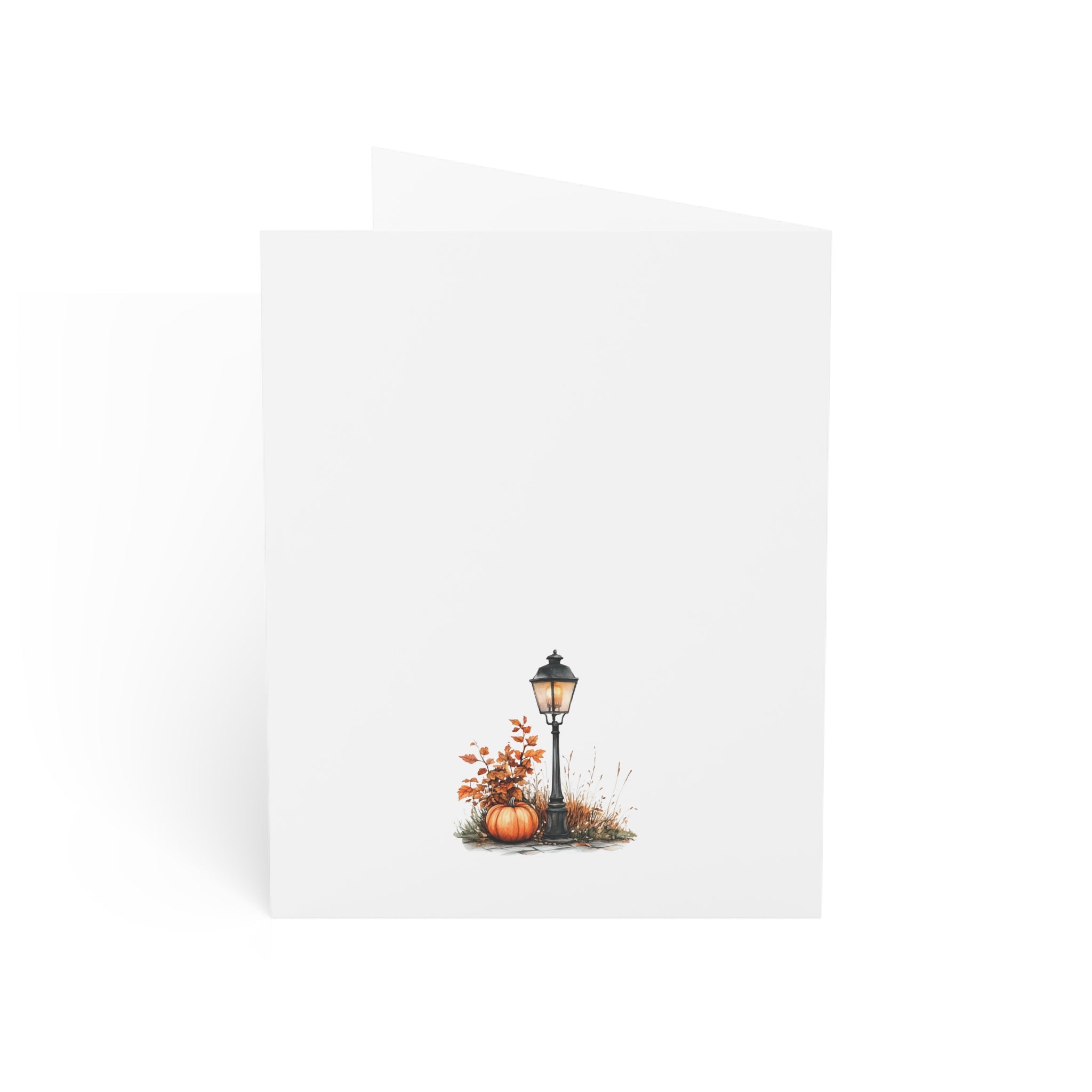 Decorative card with a street lamp and pumpkins on a white background
