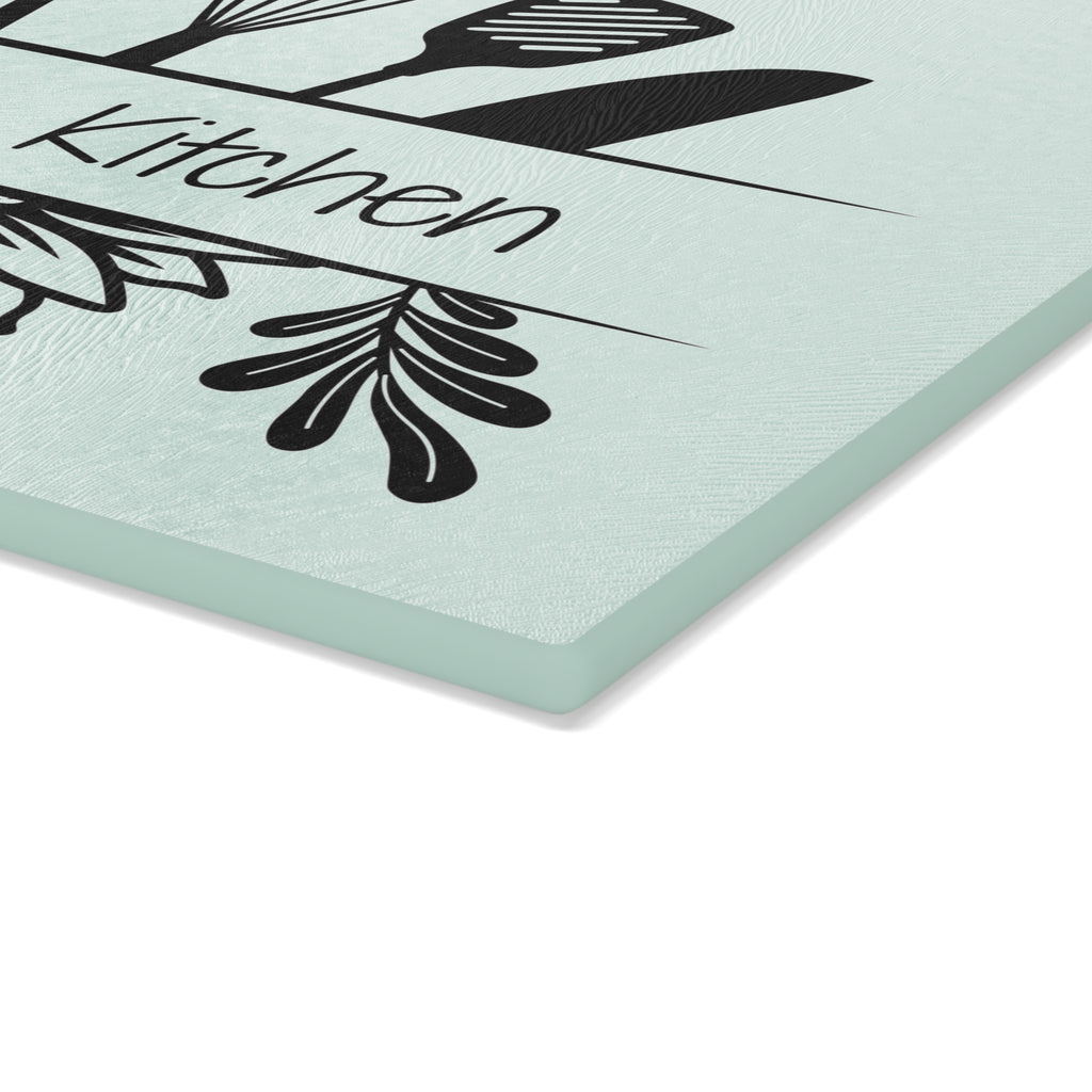 Decorative glass cutting board with utensil design and 'Babcia's Kitchen' text. For Polish babcia in the USA.