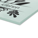 Decorative glass cutting board with utensil design and 'Babcia's Kitchen' text. For Polish babcia in the USA.
