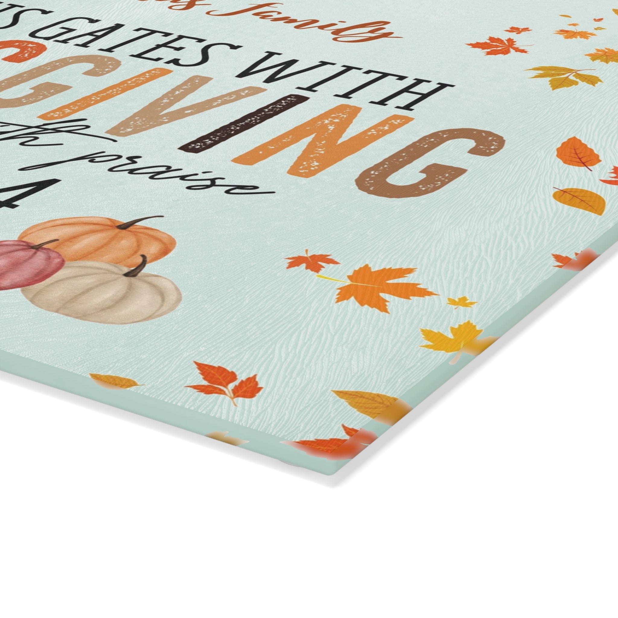 Thanksgiving-themed paper with pumpkins and leaves on a light blue background