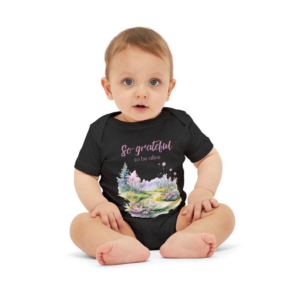 Baby onesie with "So grateful to be alive!" text and pastel nature design, made from soft 100% Airlume cotton 