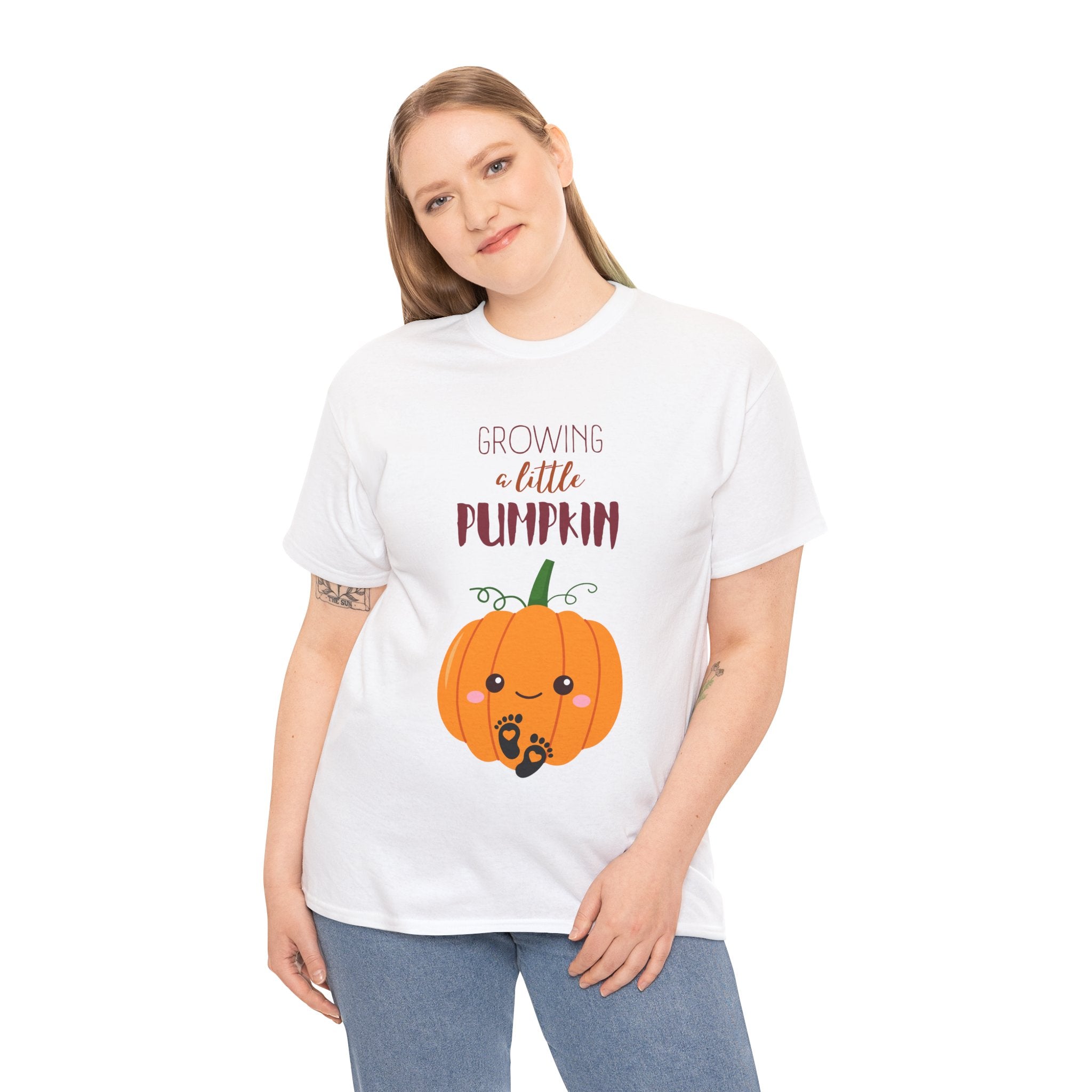 Woman wearing a white t-shirt with a pumpkin graphic and text on a white background