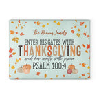 Decorative sign with Thanksgiving message and pumpkins on a light blue background