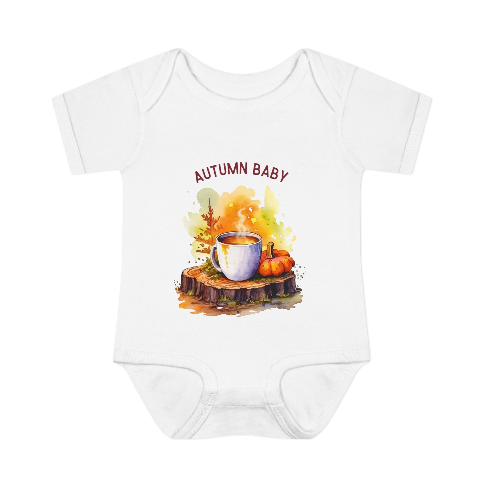 White baby onesie with 'Autumn Baby' design featuring pumpkins and a cup on a white background