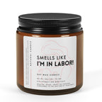 Candle jar with a label reading 'Smells like I'm in labor!' on a white background