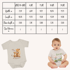 Baby onesie with lion design and size chart on a white background