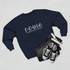 Navy blue sweatshirt with colorful text DOULA I'll be there for you, black clutch, and black sneakers on a light gray background