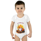Child wearing a white onesie with 'Autumn Baby' and fall-themed design on a white background