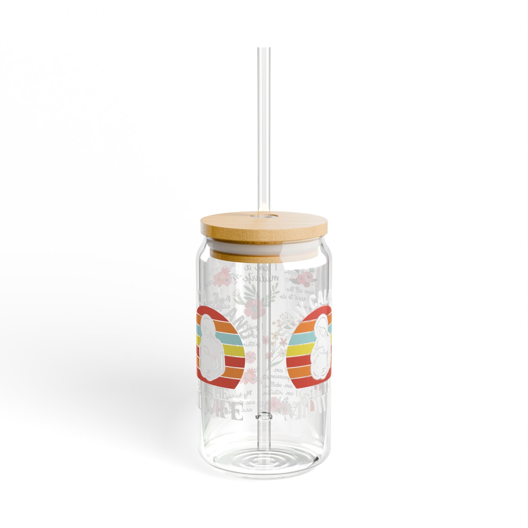 Clear tumbler with wooden lid and straw on a white background