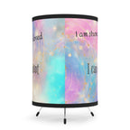 Decorative lamp with motivational phrases on a pastel gradient background