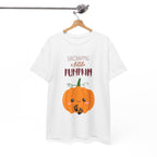 White t-shirt with a pumpkin graphic and text on a hanger against a white background