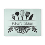 Decorative glass cutting board with utensil design and 'Babcia's Kitchen' text. For Polish babcia in the USA.