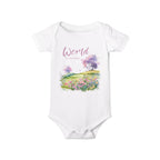 Baby onesie with "World is amazing" text and pastel nature design, made from soft 100% Airlume cotton, displayed flat with envelope neckline and snap closures.