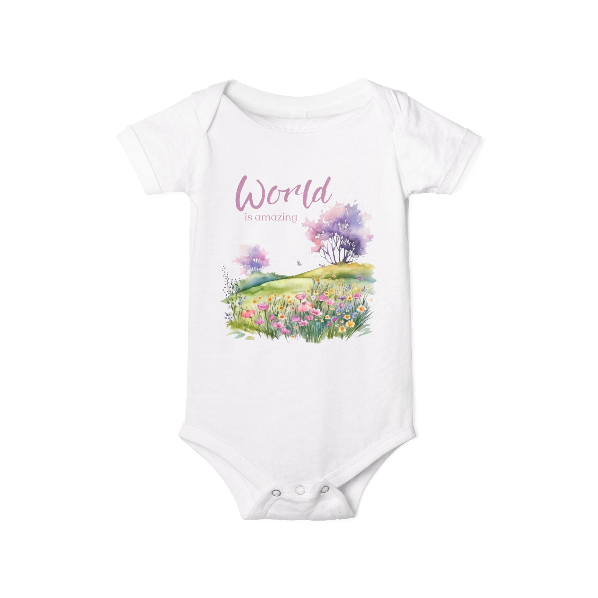 Baby onesie with "World is amazing" text and pastel nature design, made from soft 100% Airlume cotton, displayed flat with envelope neckline and snap closures.