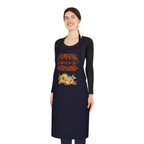 Person wearing a navy apron with 'Pumpkin Spice Everything' text and graphics on a white background
