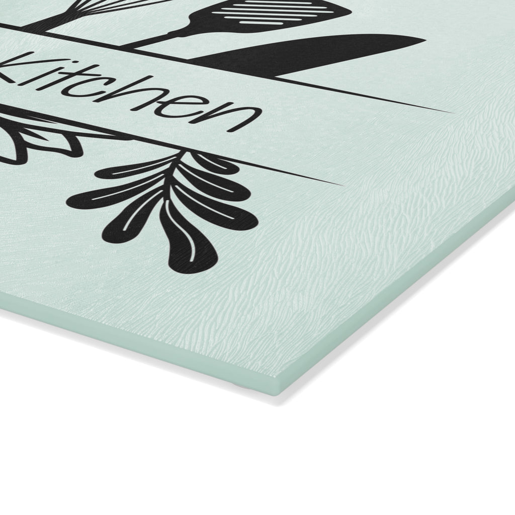 Decorative glass cutting board with utensil design and 'Babcia's Kitchen' text. For Polish babcia in the USA.