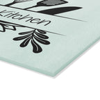 Decorative glass cutting board with utensil design and 'Babcia's Kitchen' text. For Polish babcia in the USA.