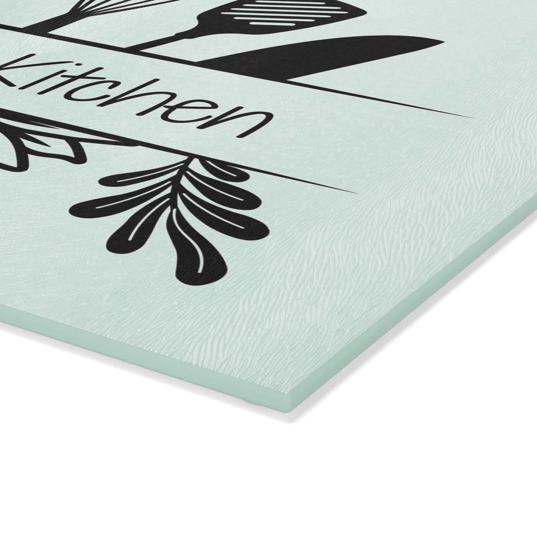 Decorative glass cutting board with utensil design and 'Babcia's Kitchen' text. For Polish babcia in the USA.