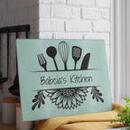 Decorative kitchen sign with utensil design and 'Babcia's Kitchen' text on a light blue background. For Polish babcia in the USA.