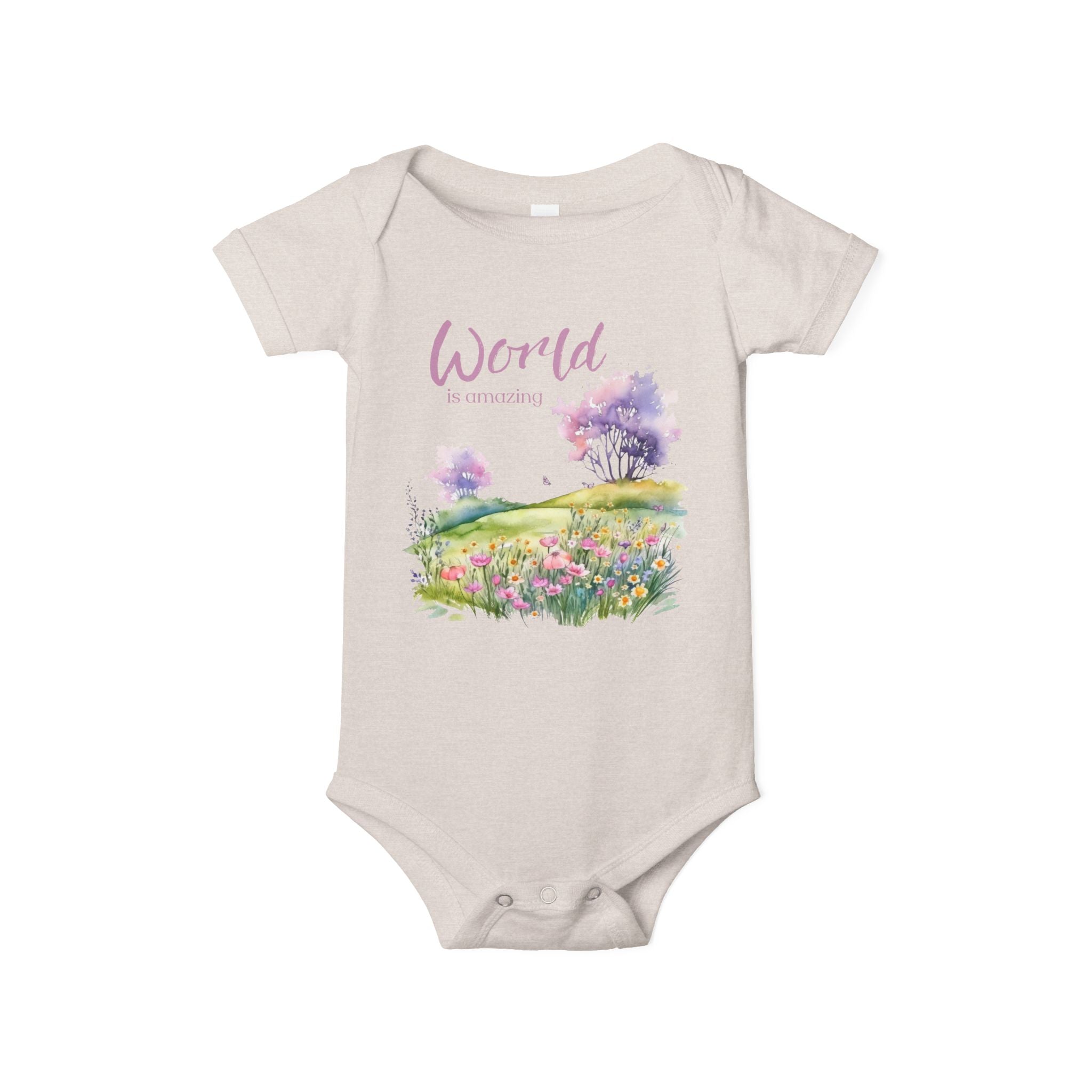 Baby onesie with "World is amazing" text and pastel nature design, made from soft 100% Airlume cotton, displayed flat with envelope neckline and snap closures.