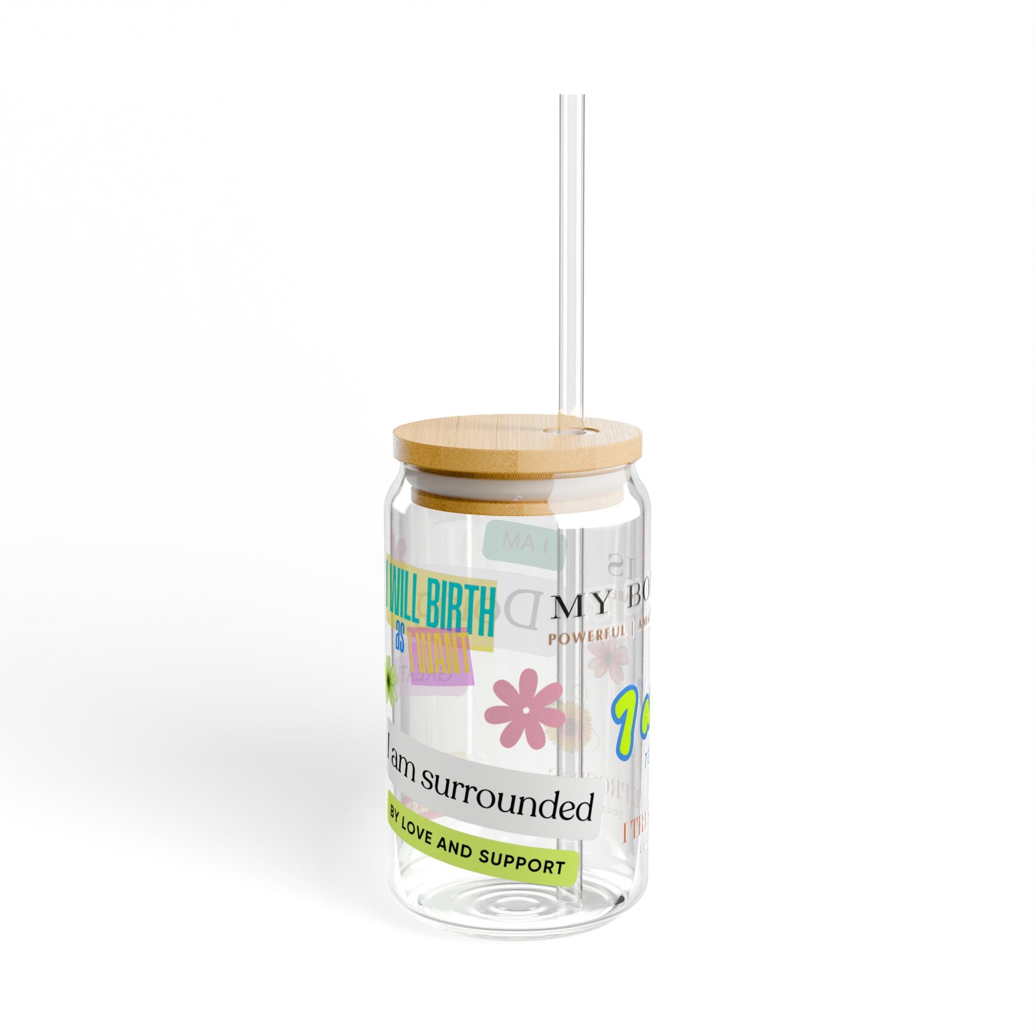 Clear tumbler with wooden lid and straw, featuring text and graphics on a white background