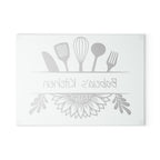 Decorative glass cutting board with utensil design and 'Babcia's Kitchen' text. For Polish babcia in the USA.
