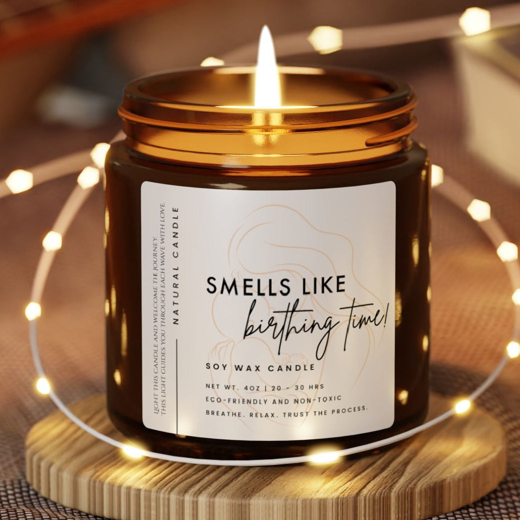 Candle labeled 'Smells Like Birthing Time' for a childbirth, homebirth space