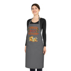 Woman wearing a gray apron with pumpkin spice everything design on a white background