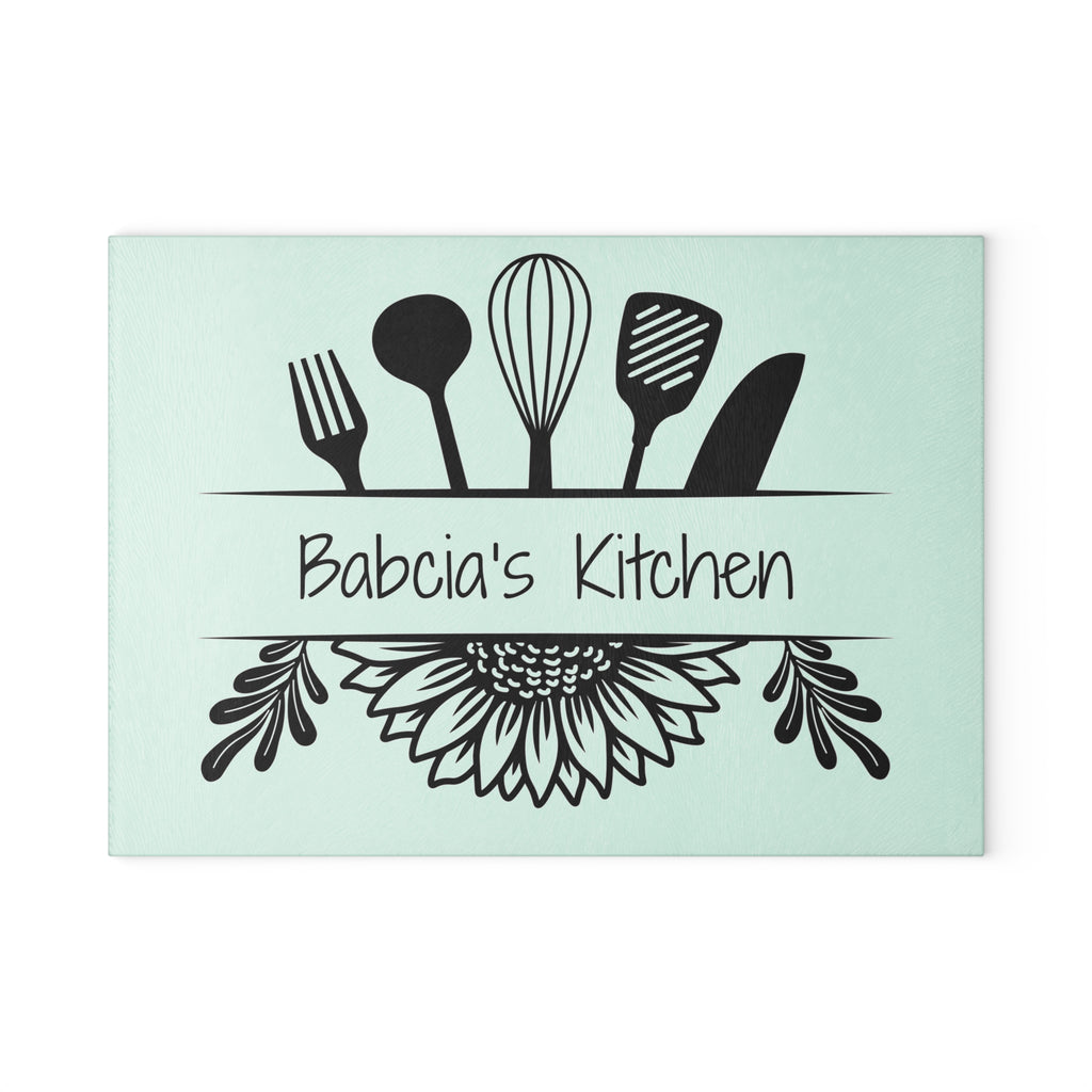 Decorative kitchen sign with utensil design and 'Babcia's Kitchen' text on a light blue background. For Polish babcia in the USA.