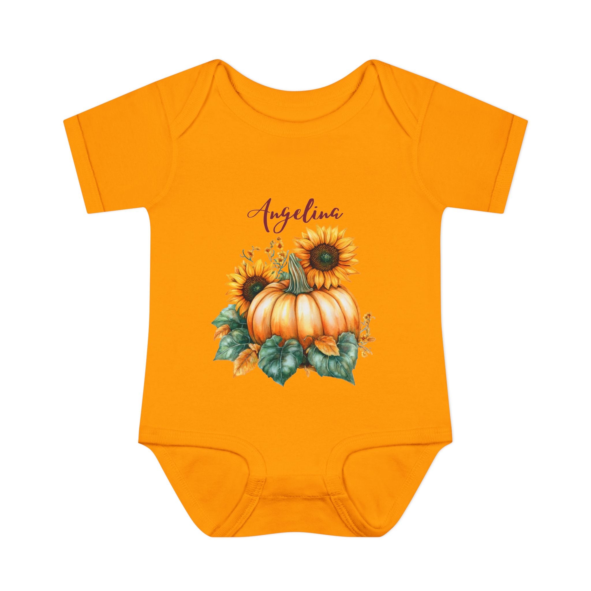 Orange baby onesie with pumpkin and sunflower design on a white background