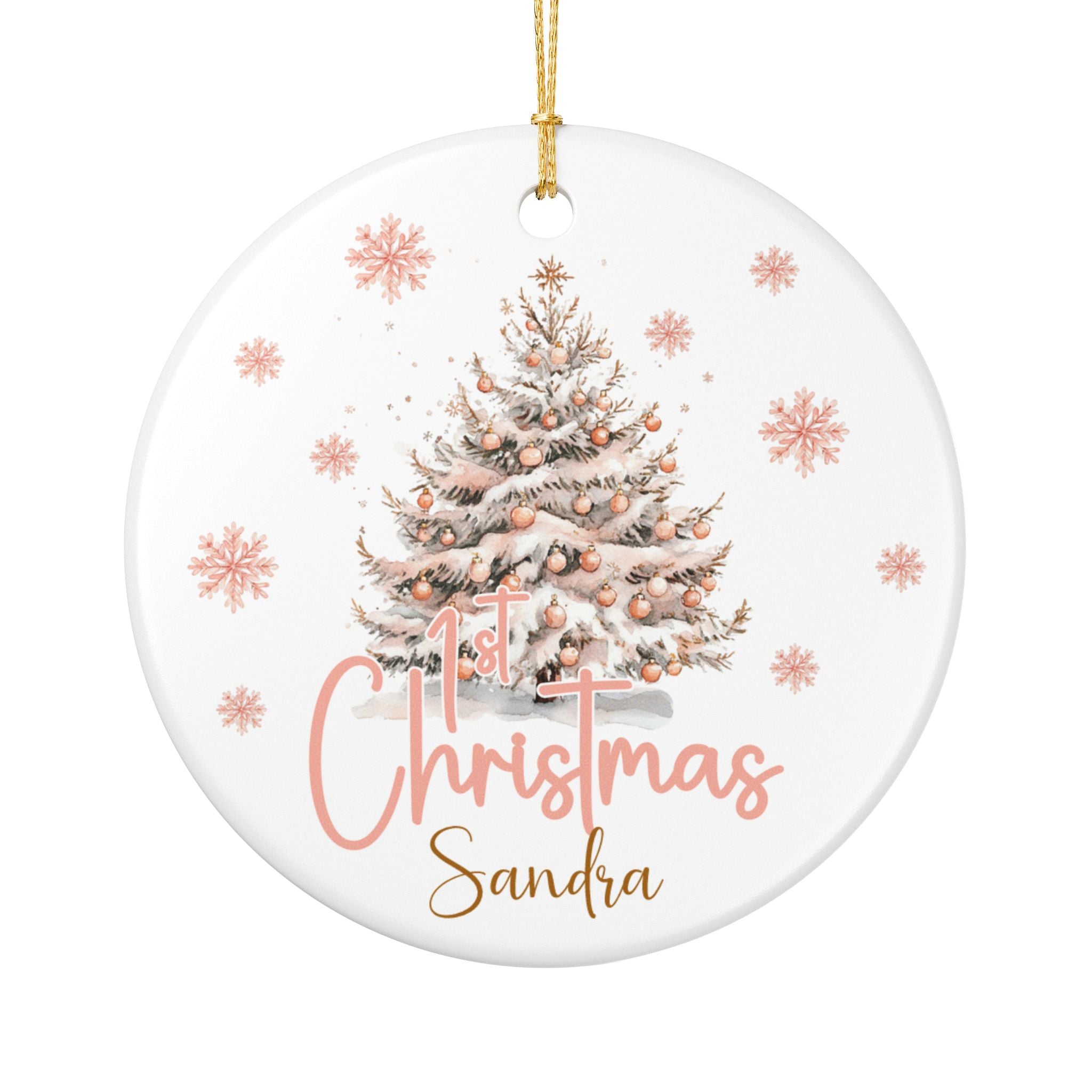 Christmas ornament with a tree and '1st Christmas Sandra' text on a white background