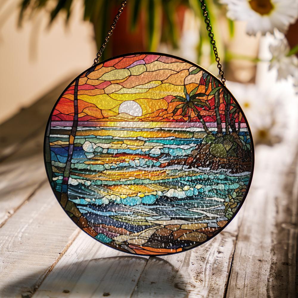 Stained glass suncatcher featuring a vibrant beach sunset with ocean waves and warm colors