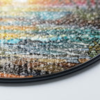 Stained glass suncatcher featuring a vibrant beach sunset with ocean waves and warm colors details zoomed