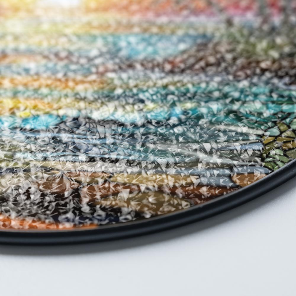 Stained glass suncatcher featuring a vibrant beach sunset with ocean waves and warm colors details zoomed