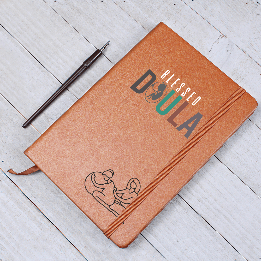 Journal for a doula on a premium vegan leather cover, includes 200 lined pages, a ribbon bookmark, and a brown elastic closure band.