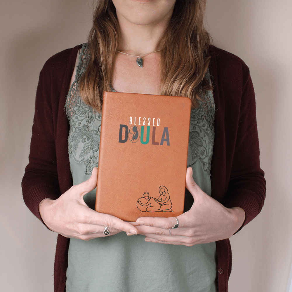 Journal for a doula on a premium vegan leather cover, includes 200 lined pages, a ribbon bookmark, and a brown elastic closure band.